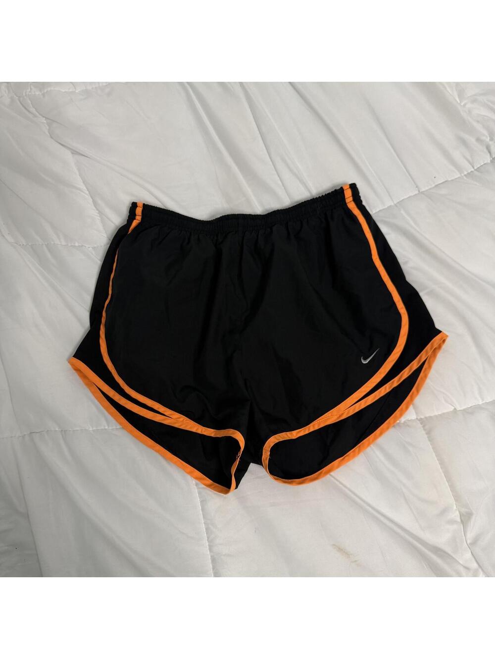 nike orange and black track shorts medium